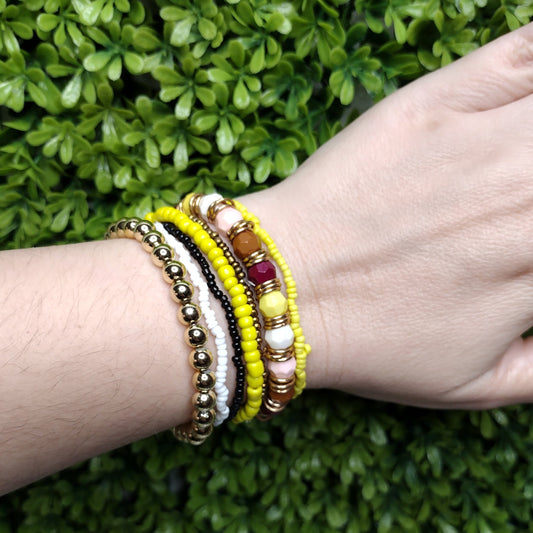 Set De Pulseras Amarillas